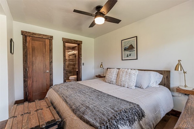 2235 Storm Meadows Dr Unit 312, Steamboat Springs, CO 80477 - bedroom featuring a ceiling fan, baseboards, and connected bathroom