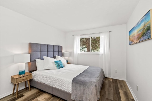 1300 Athens Plz Unit 2, Steamboat Springs, CO 80487 - bedroom featuring wood finished floors and baseboards