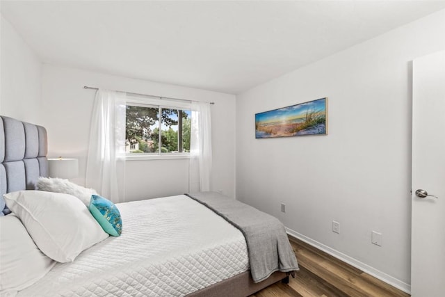 1300 Athens Plz Unit 2, Steamboat Springs, CO 80487 - bedroom featuring wood finished floors and baseboards