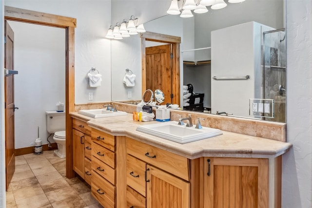 180 Emmett Lode Rd, Breckenridge, CO 80424 - bathroom with a sink, a shower stall, double vanity, and toilet
