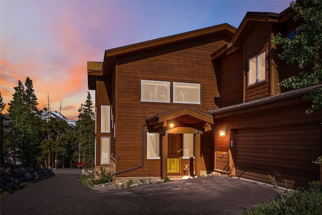 180 Emmett Lode Rd, Breckenridge, CO 80424 - modern home featuring aphalt driveway and a garage