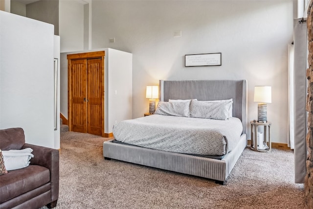 180 Emmett Lode Rd, Breckenridge, CO 80424 - bedroom with baseboards, a high ceiling, and carpet floors