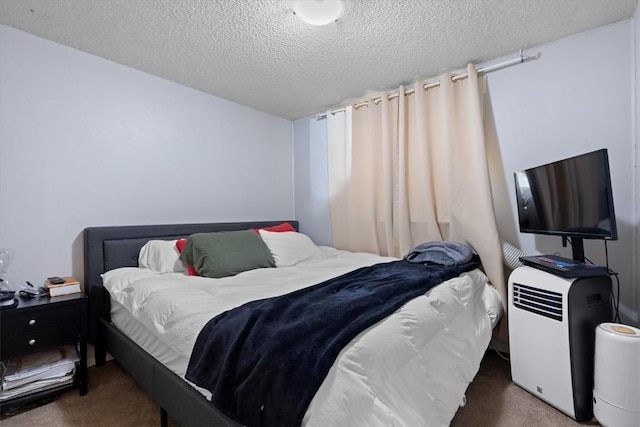 2646 Riverside Dr Unit A, Steamboat Springs, CO 80487 - carpeted bedroom featuring a textured ceiling