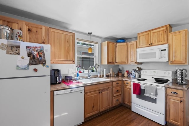 2646 Riverside Dr Unit A, Steamboat Springs, CO 80487 - kitchen featuring white appliances, light countertops, decorative light fixtures, and dark wood finished floors