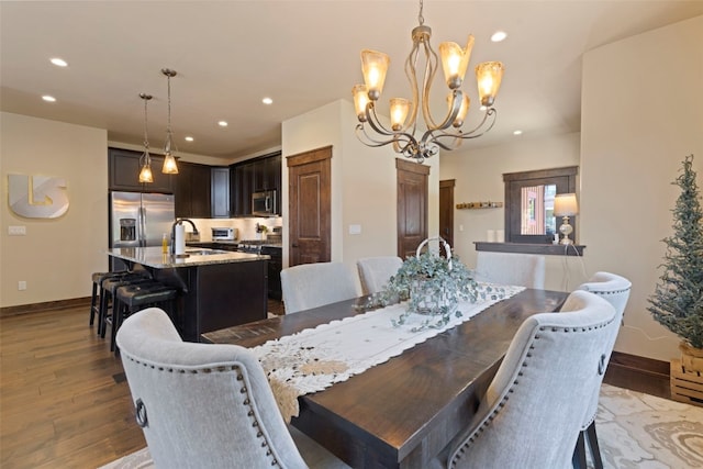 799 Independence Rd Unit 799, Keystone, CO 80435 - dining area featuring a chandelier, dark wood-type flooring, and recessed lighting