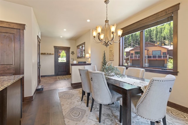 799 Independence Rd Unit 799, Keystone, CO 80435 - dining space featuring a chandelier, recessed lighting, and dark wood-type flooring