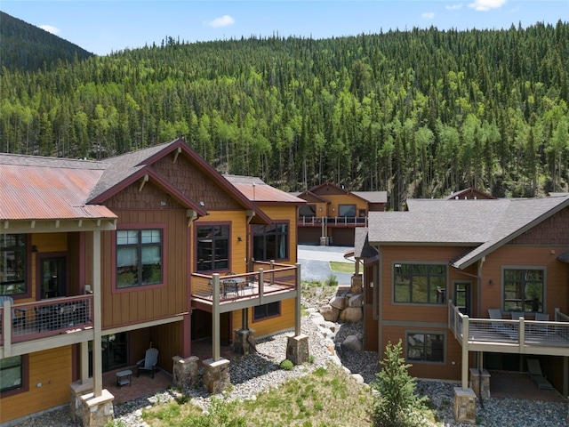 799 Independence Rd Unit 799, Keystone, CO 80435 - rear view of house with a wooded view and a mountain view