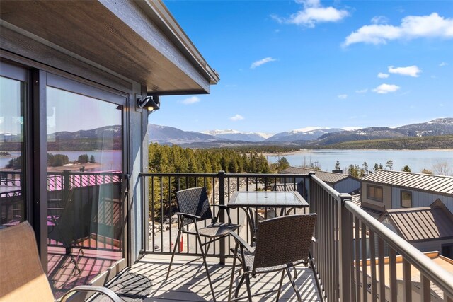 1660 Lakeview Ter Unit 306F, Frisco, CO 80443 - wooden terrace with a water and mountain view