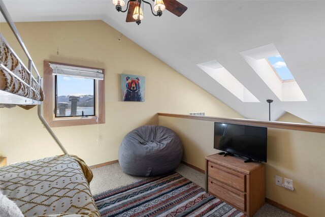1660 Lakeview Ter Unit 306F, Frisco, CO 80443 - sitting room featuring a skylight, lofted ceiling, carpet, and baseboards