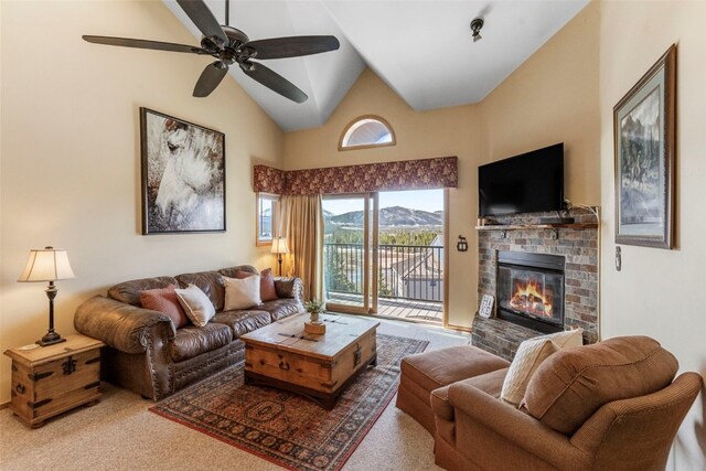 1660 Lakeview Ter Unit 306F, Frisco, CO 80443 - living area with a fireplace, carpet, ceiling fan, and high vaulted ceiling