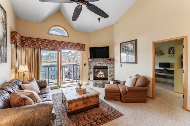 1660 Lakeview Ter Unit 306F, Frisco, CO 80443 - living room featuring high vaulted ceiling, light carpet, ceiling fan, and a fireplace