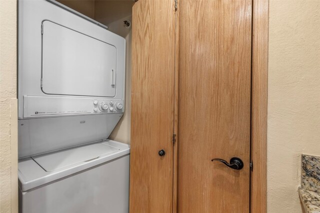 1660 Lakeview Ter Unit 306F, Frisco, CO 80443 - laundry area featuring estacked washer and dryer