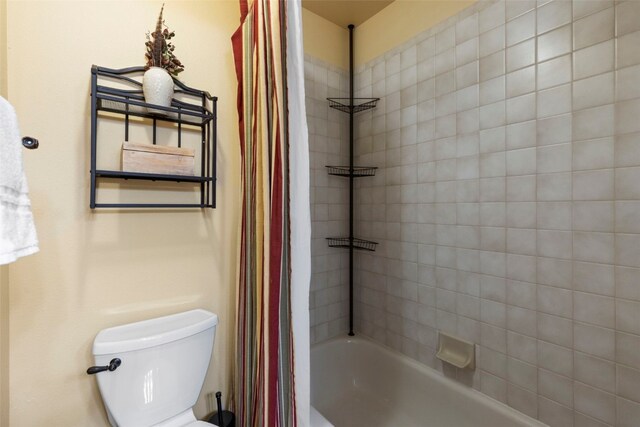 1660 Lakeview Ter Unit 306F, Frisco, CO 80443 - full bath featuring shower / bath combo with shower curtain and toilet