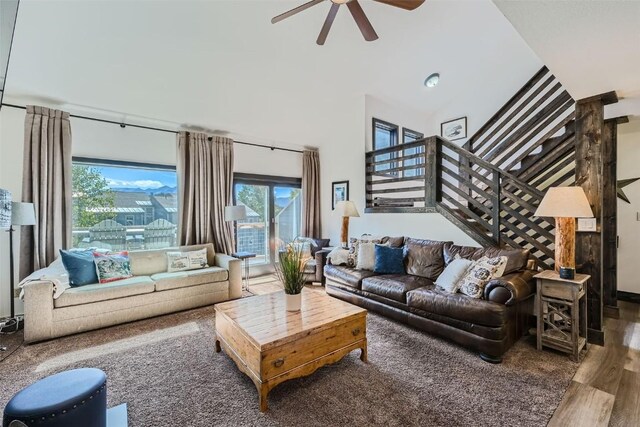 111 Corinthian Cir Unit D, Dillon, CO 80435 - living area with ceiling fan, a healthy amount of sunlight, wood finished floors, and stairs