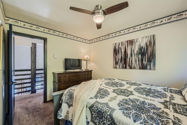 111 Corinthian Cir Unit D, Dillon, CO 80435 - bedroom featuring dark carpet and ceiling fan