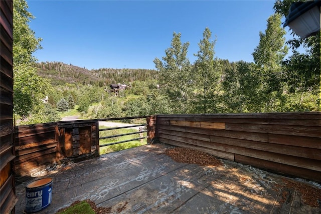 2495/2497 Val Disere Cir, Steamboat Springs, CO 80487 - view of patio / terrace featuring a wooded view and a deck