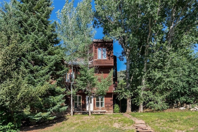 2495/2497 Val Disere Cir, Steamboat Springs, CO 80487 - back of property featuring a yard