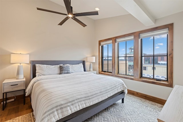 317 Granite St Unit 3, Frisco, CO 80443 - bedroom featuring wood finished floors, baseboards, lofted ceiling, and a ceiling fan