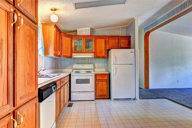 605 Lamb Mountain Rd, Fairplay, CO 80440 - kitchen featuring white appliances, extractor fan, light countertops, ornamental molding, and vaulted ceiling