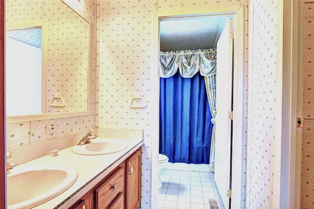 605 Lamb Mountain Rd, Fairplay, CO 80440 - full bathroom with double vanity, wallpapered walls, and tile patterned floors