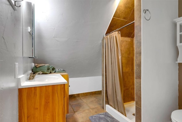 216 Ambush Ln, Jefferson, CO 80456 - bathroom with vanity, a shower stall, and tile patterned flooring