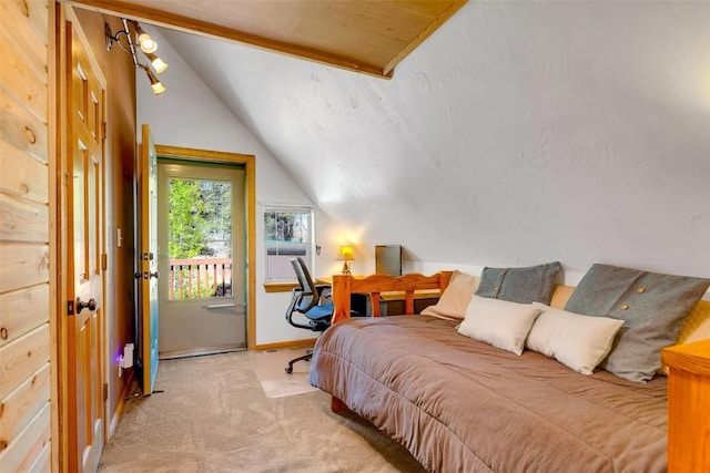 216 Ambush Ln, Jefferson, CO 80456 - carpeted bedroom featuring lofted ceiling and baseboards