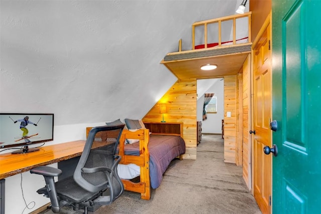 216 Ambush Ln, Jefferson, CO 80456 - bedroom featuring wooden walls, an office area, and carpet flooring