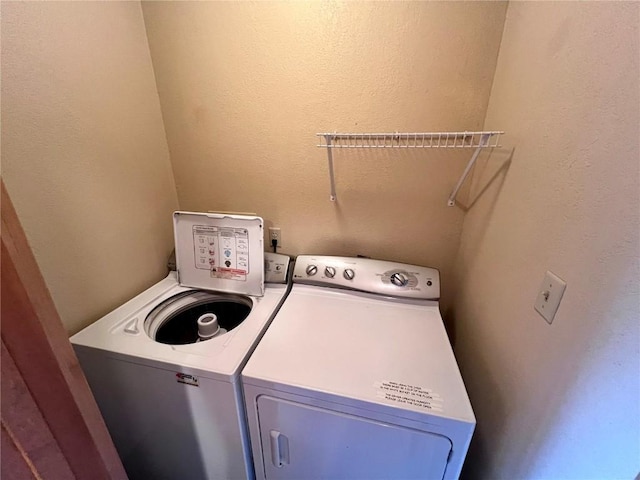 laundry room featuring washer and dryer