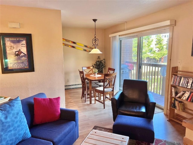 720 Lagoon Dr Unit D, Frisco, CO 80443 - living area with baseboard heating and wood finished floors