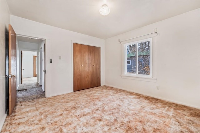 401 Moffat Ave, Oak Creek, CO 80467 - unfurnished bedroom with carpet floors, a closet, and baseboards
