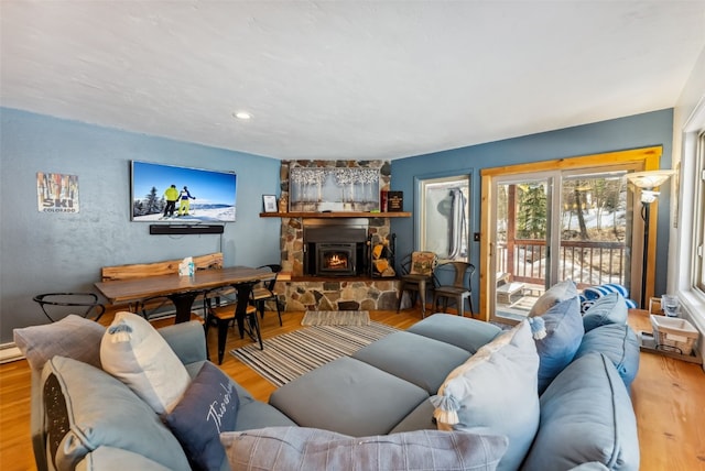 876 Broken Lance Dr Unit 876, Breckenridge, CO 80424 - living area with wood finished floors and a fireplace