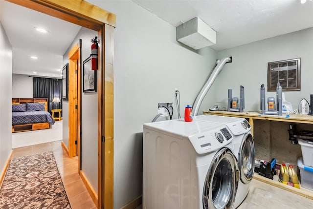 876 Broken Lance Dr Unit 876, Breckenridge, CO 80424 - washroom with separate washer and dryer, tile patterned floors, and recessed lighting