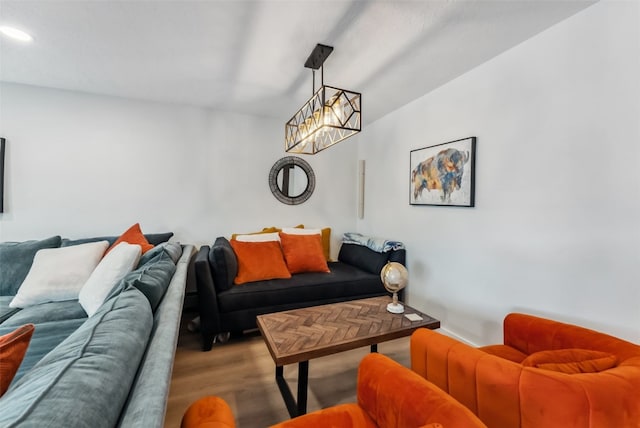 living room featuring wood finished floors and recessed lighting