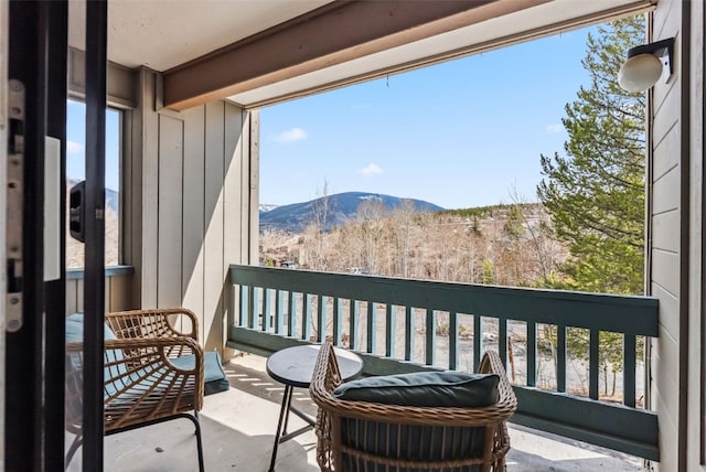 balcony featuring a mountain view