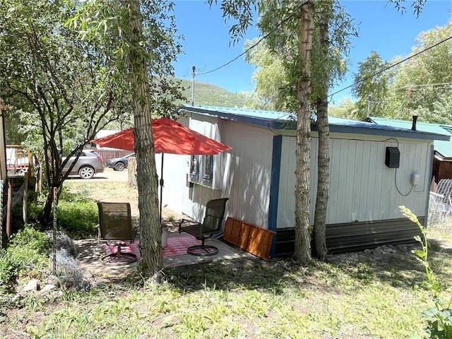 205 Arthur Ave, Oak Creek, CO 80467 - rear view of house featuring a metal roof