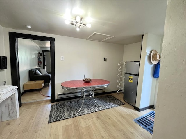 205 Arthur Ave, Oak Creek, CO 80467 - dining space featuring attic access and light wood-style floors