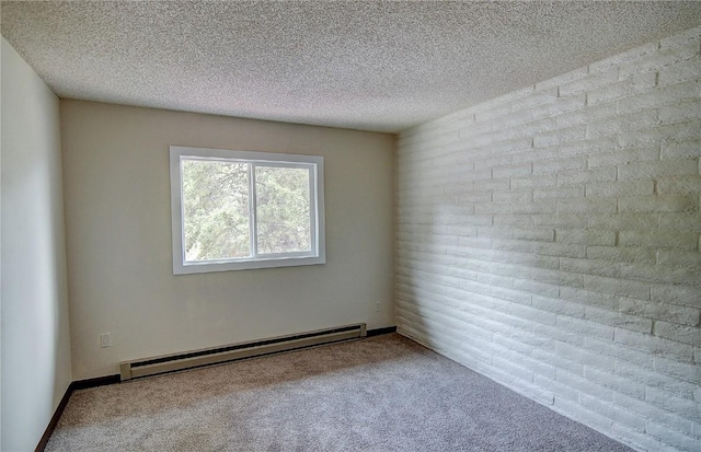 8 Sequoia Ct Unit 8, Steamboat Springs, CO 80487 - carpeted empty room featuring a baseboard radiator and a textured ceiling