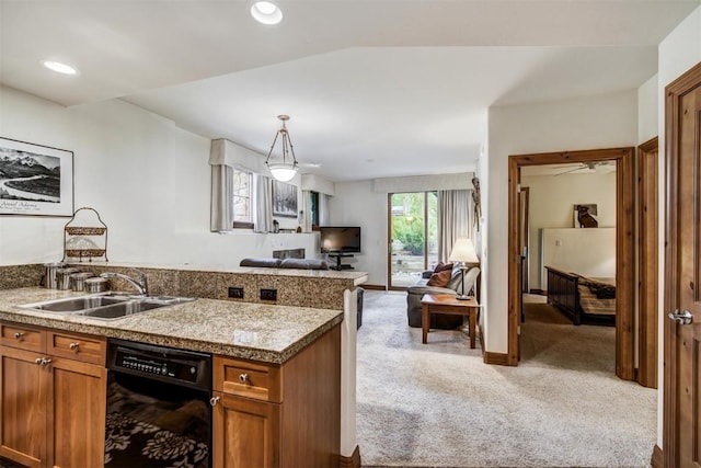 kitchen featuring dishwasher, a sink, brown cabinets, light carpet, and recessed lighting