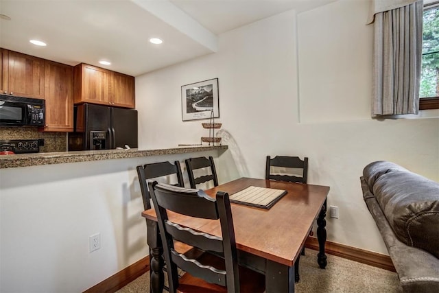 dining area featuring baseboards, recessed lighting, and carpet