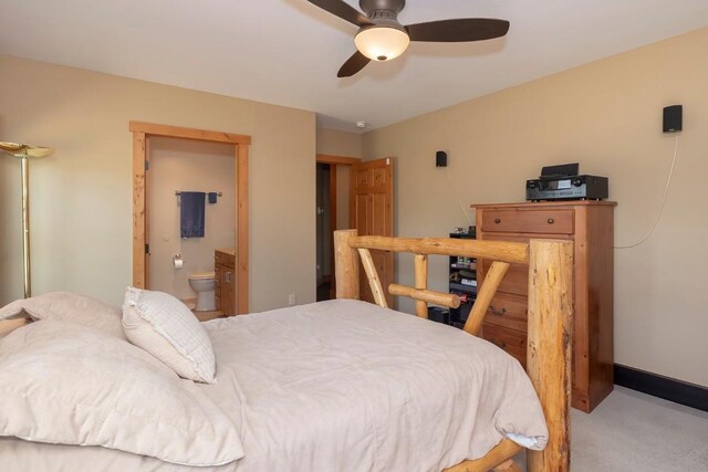 12000 Ute Pass Rd, Parshall, CO 80468 - carpeted bedroom featuring ensuite bath and a ceiling fan