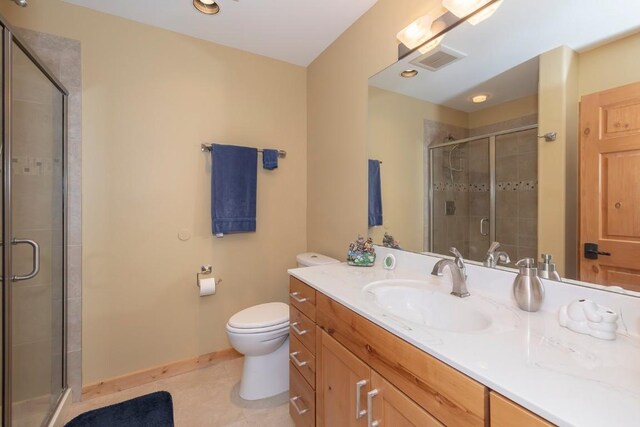 12000 Ute Pass Rd, Parshall, CO 80468 - bathroom featuring vanity, toilet, a shower stall, and baseboards