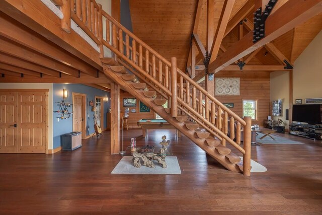 12000 Ute Pass Rd, Parshall, CO 80468 - living room with stairs, high vaulted ceiling, wood finished floors, and wood ceiling with exposed beams