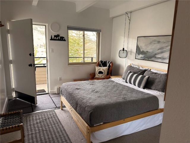 bedroom featuring beam ceiling