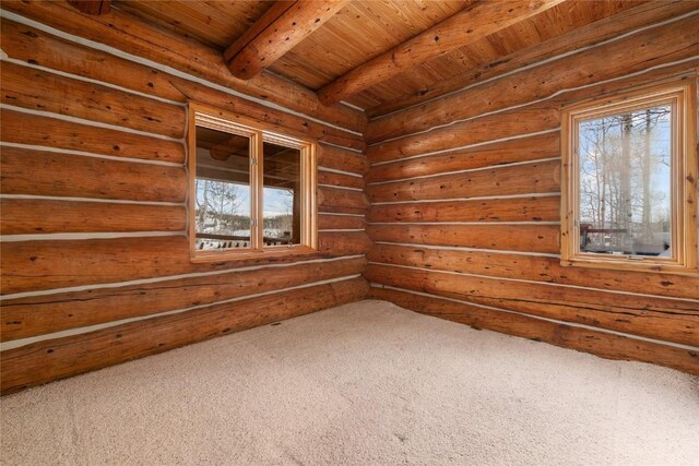 57785 Saturn Ct, Clark, CO 80428 - spare room featuring carpet floors, plenty of natural light, beam ceiling, and wooden ceiling