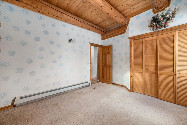 57785 Saturn Ct, Clark, CO 80428 - unfurnished bedroom featuring a baseboard radiator, wallpapered walls, carpet flooring, a wooden ceiling with exposed beams, and a closet