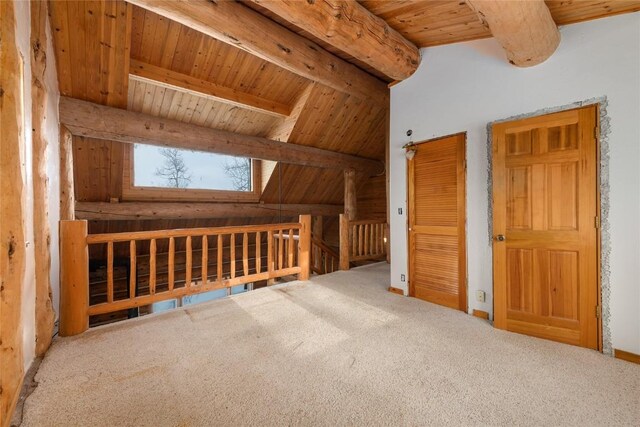 57785 Saturn Ct, Clark, CO 80428 - additional living space with wooden ceiling, vaulted ceiling with skylight, and carpet flooring