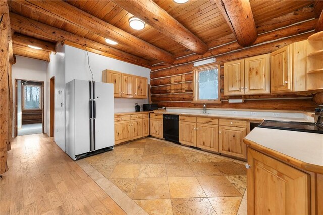 57785 Saturn Ct, Clark, CO 80428 - kitchen featuring freestanding refrigerator, dishwasher, open shelves, plenty of natural light, and rustic walls