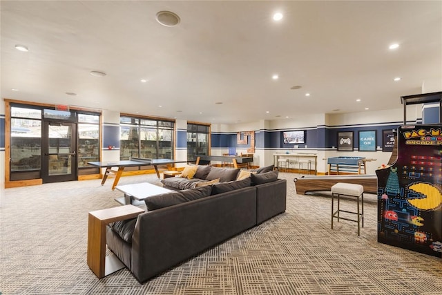 living room featuring carpet flooring and recessed lighting