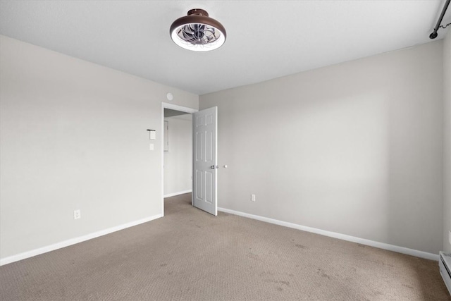 30311 County Road 16 Unit 105, Oak Creek, CO 80467 - spare room featuring carpet floors, baseboards, and baseboard heating