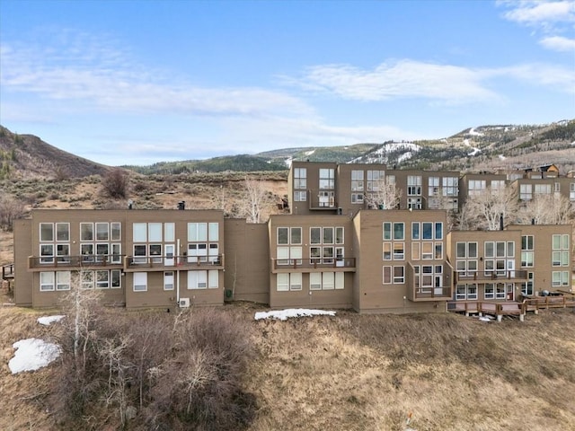 30311 County Road 16 Unit 105, Oak Creek, CO 80467 - rear view of property with a mountain view